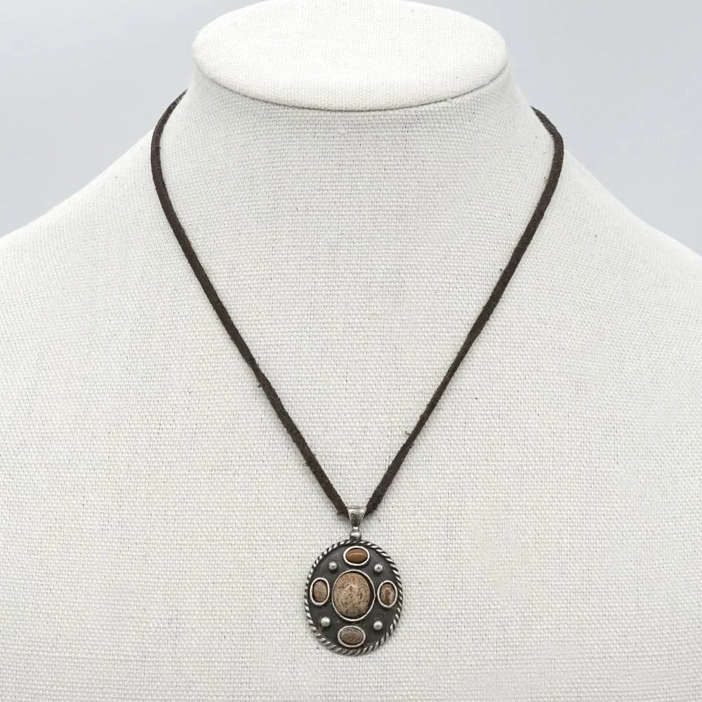 Necklace with leather cord and silver pendant. - Picture 1 of 3